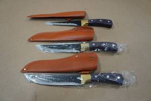 lot 251 image: Carbon Steel Viking Co Hammered Knife Set