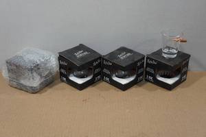 lot 315 image: 4 Lucky Shot 2oz Shot Glasses with Embedded Bullets