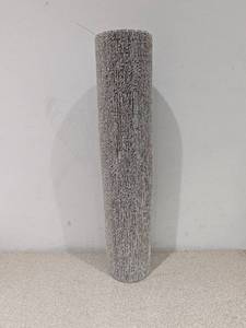 lot 75 image: CHILEWICH HEATHERED SHAG UTILITY RUG  TAN