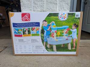 lot 106 image: STEP 2 RAIN SHOWERS & FLOW WATER TABLE
