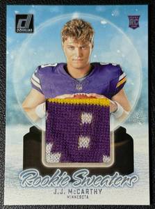 lot 21A image: JJ McCarthy Rookie Sweaters 2024 Donruss #RHS-JJM Minnesota Vikings RC Football Card