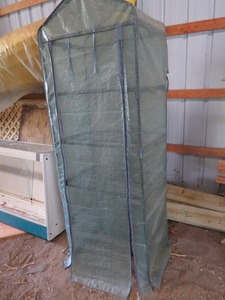 lot 14 image: Portable Greenhouse with wire Shelves