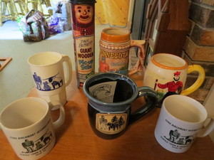 lot 76 image: Mixed Lot of Paul Bunyan Collectible Mugs and Pick-Up Sticks Game