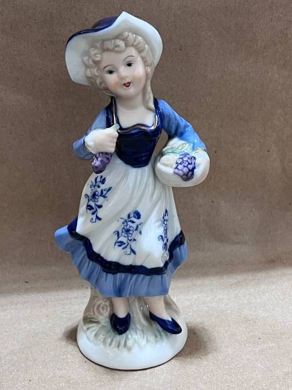 lot 103 image: Pair of Porcelain Figurines Boy and Girl with Grapes
