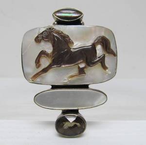 lot 26 image: Large Signed Sterling Silver & Carved Mother of Pearl Horse Brooch Pendant