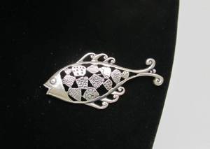 lot 52 image: Signed Sterling Silver Southwestern Stylized Fish Brooch