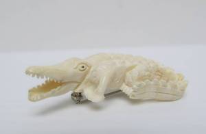 lot 53 image: Hand Carved Bone Alligator Brooch