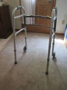 lot 229 image: Metal frame walking aid...