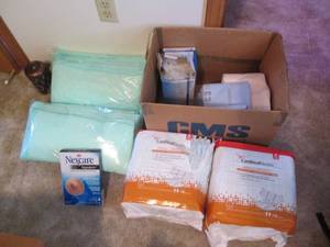 lot 268 image: New oil diffuser, bed pads and adul...