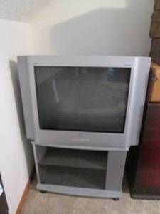 lot 293 image: RCA sdtv tune television with Rolli...