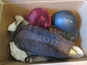 lot 300 image: Box lot of horse tack and riding he...
