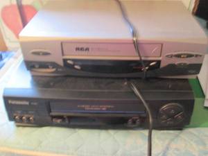 lot 310 image: Pair of Vintage VHS players plus bo...