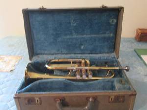 Antique brass tone trumpet with vel...