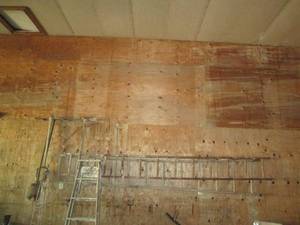 lot 157 image: 3 wood ladders, post hole diggers a...