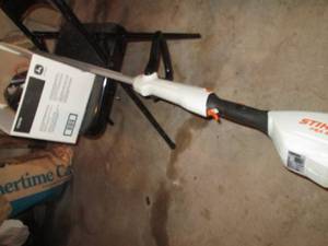 lot 97 image: Stihl battery powered weed whip wit...