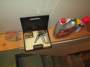 lot 106 image: Staple gun in case, and garage chem...