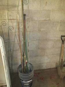 lot 131 image: Vintage fishing poles and more...