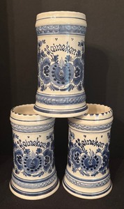 lot 180 image: Three Vintage Delft Heineken Steins