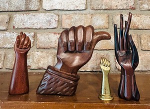 lot 51 image: Brazilian Jacaranda Rosewood Hand Sculptures and Brass Fist with Maker Imprint