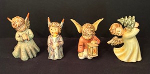 lot 257 image: Four Angelic Hummel Figurines including Flying High, Angelic Guide, Light Up the Night and Peace on Earth