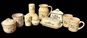 lot 287 image: International Stoneware Heartland Cups, Pitcher, SaltPepper Shakers, Butter Dish, Napkin Holder and More
