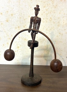 lot 335 image: Vintage Balancing Man Decor