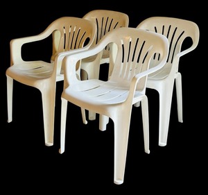 lot 354 image: Four White Plastic Outdoor Chairs by Syroco