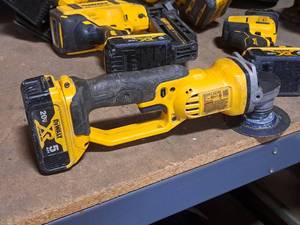 lot 47 image: DeWalt 4-125 20V Grinder DCG412 with DeWalt 20V 5Ah Lithium Ion Battery