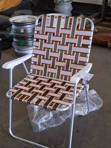 lot 202 image: Two Hearted Folding Lawn Chair