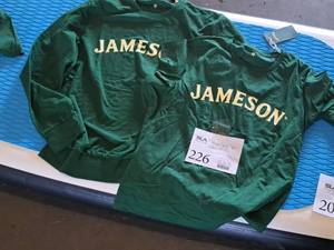 lot 226 image: Lot of (2) Jameson logo Size Medium Shirts - Long Sleeve and Short Sleeve