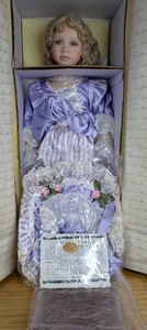 lot 14 image: New Laurel Porcelain Doll Designers Guild Collection by Pat Loveless 1852000 with Certificate of Authentication