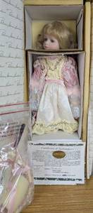lot 16 image: New Isabella Porcelain Doll Designers Guild Collection by Pat Loveless 5162000 with Certificate of Authentication