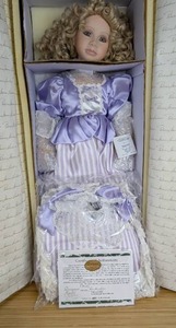 lot 18 image: New Laurel Porcelain Doll Designers Guild Collection by Pat Loveless 2112000 with Certificate of Authentication