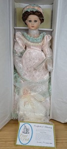 lot 27 image: New Elizabeth and Betsy Court of Dolls 35525000 with Certificate of Authentication