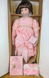 lot 37 image: New Megan Porcelain Doll Belles Bebes Collection by Emily Graham 3902000 with Certificate of Authentication