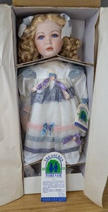 lot 29 image: New Gail Porcelain Doll Treasures Forever Collection 10424000 with Certificate of Authentication
