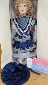 lot 43 image: New Lisa Porcelain Doll William Tung Collection 19214000 with Certificate of Authentication