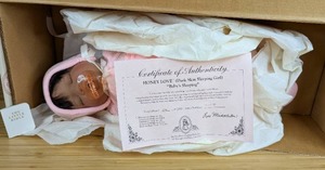 lot 61 image: New Babys Sleeping Porcelain Doll Honey Love Collection by Lee Middleton 3462000 with Certificate of Authentication