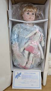lot 73 image: New Bunny Porcelain Doll Premier Collection by Karen McDonald 4582000 with Certificate of Authentication