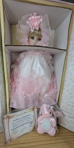 lot 88 image: New Bunnie Porcelain Doll Welden Museum Collection by Rustie 7902000 with Certificate of Authentication