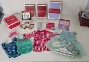 lot 217 image: New in Box American Girl Doll Outfits including American Girl Doll Rainy Day Jacket, Angel in Training Ballerina and More