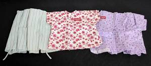 lot 133 image: American Girl Doll Hospital Tops and Bottoms