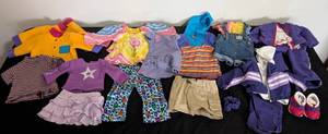 lot 136 image: Assorted American Girl Doll Tops and Bottoms