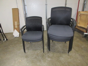 lot 235 image: MESH BACK STACKING ARM CHAIRS