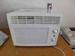 lot 62 image: GE 5,000 BTU 115V Window Air Conditioner Cools 150 Sq. Ft. in White