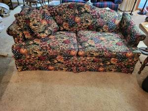 lot 12 image: Floral Patterned Full-Size Sofa with Matching Cushions