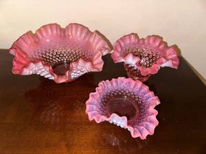 lot 18 image: Set of 3 Vintage Fenton Cranberry Opalescent Hobnail Ruffled Bowls