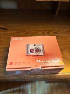 lot 235 image: Canon PowerShot A520 Digital Camera with Accessories and Manuals