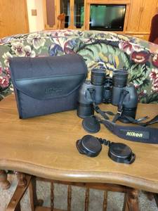 lot 404 image: Nikon Vision Japan Action 7x50 Binoculars with Case and Accessories