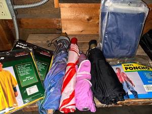 lot 425 image: Collection of 4 Umbrellas and Several Vinyl Ponchos